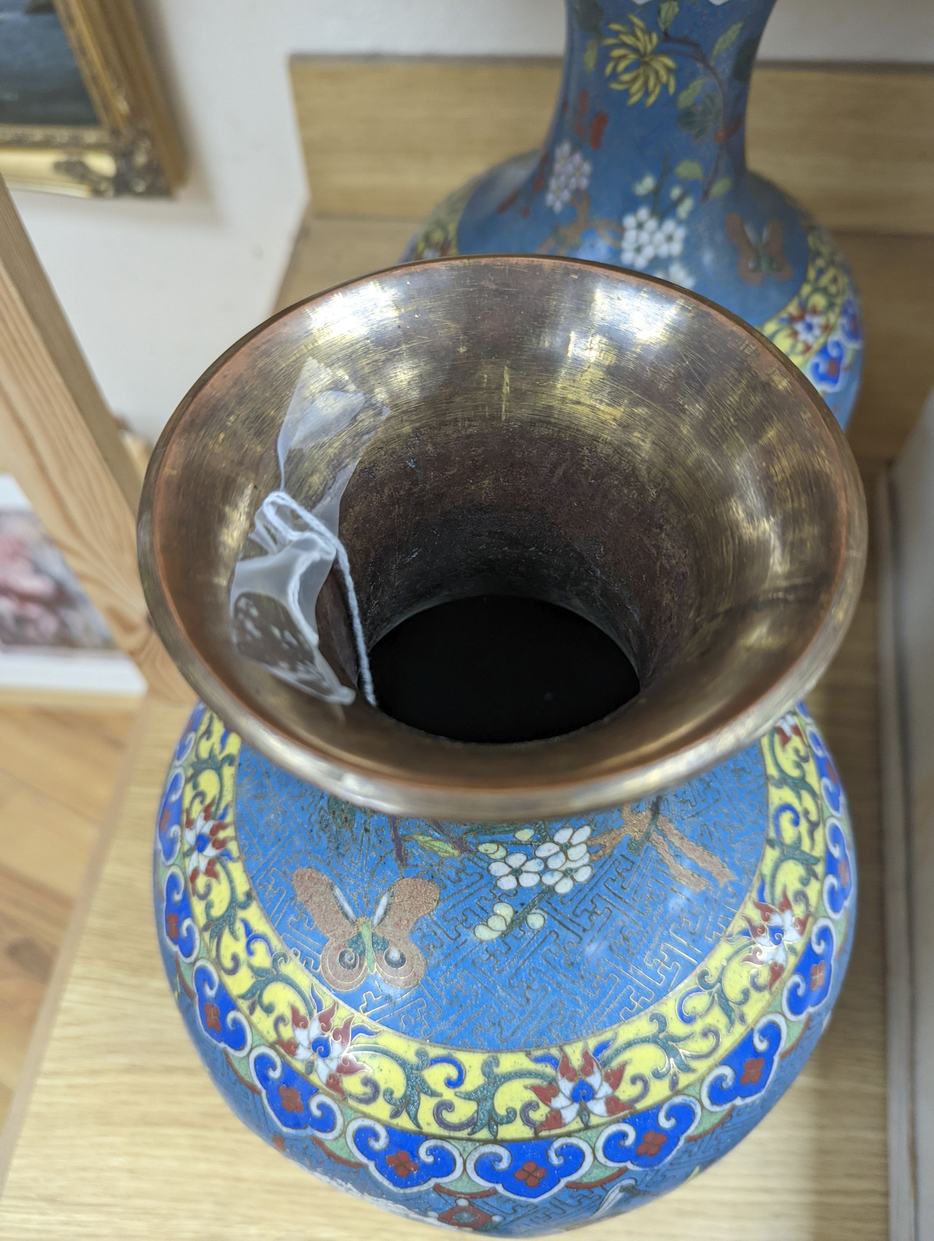 A pair of late 19th/early 20th century Chinese cloisonné enamel ‘Buddhist emblems’ vases 36cm